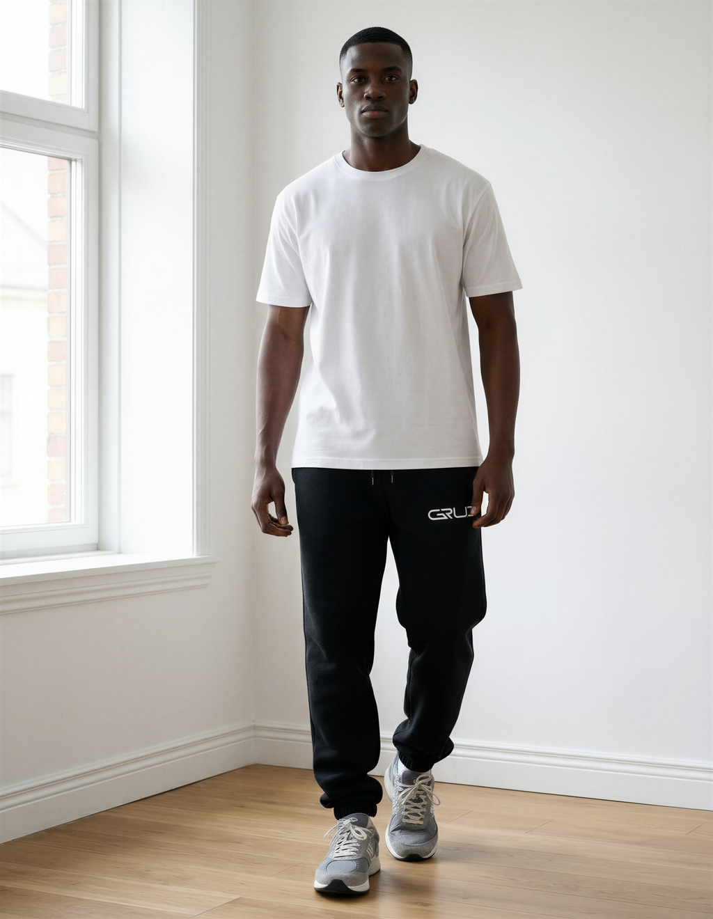 GRUD Clothing Essentials Sweat Pants in black — tapered ankle, heavyweight fleece