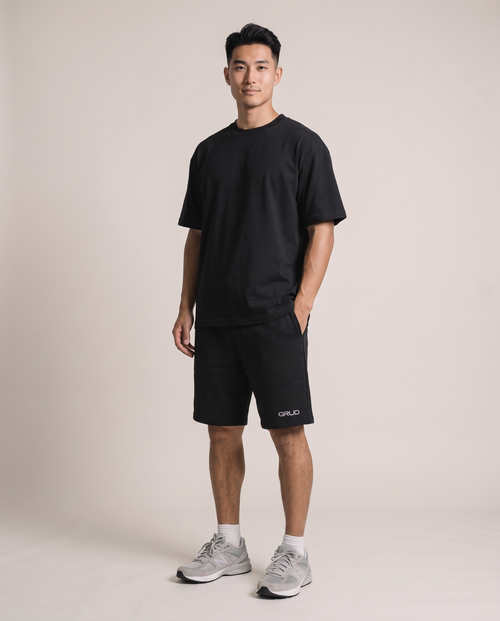 GRUD Oversized Shorts in black, above-knee length