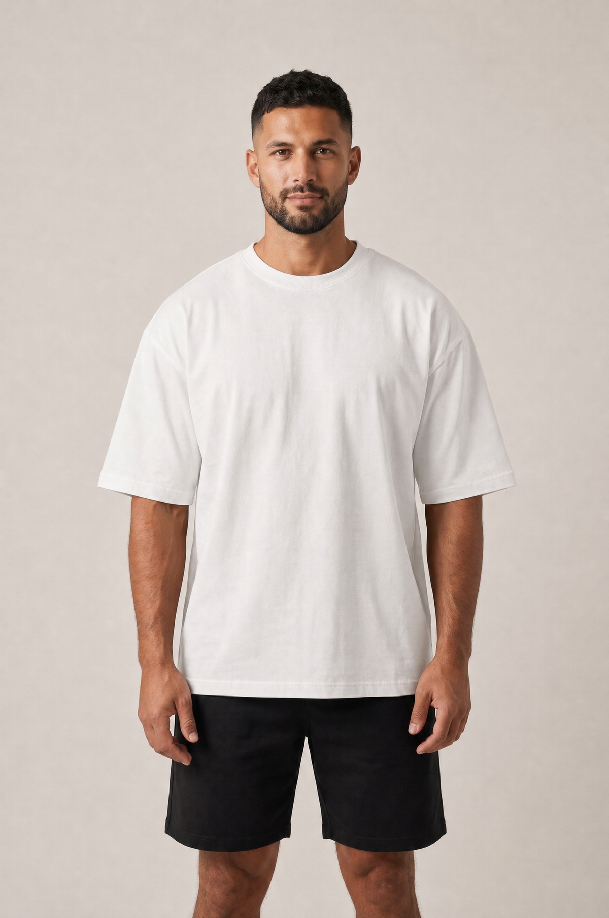 Model wearing the GRUD Heavyweight Oversized Tee in white, front view